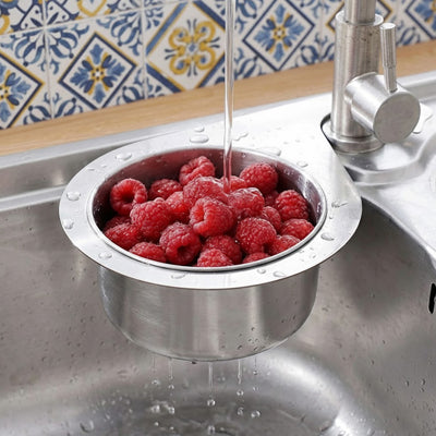 Egouttoir Evier rempli de framboises