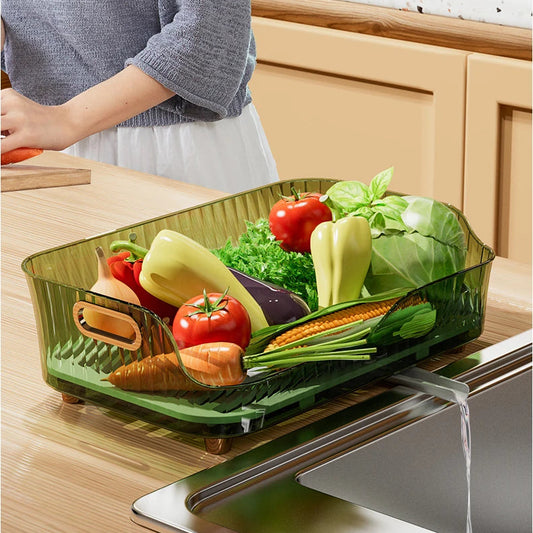 Égouttoir vert rempli fruits légumes