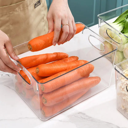 Remplissage de l'Organisateur frigo avec des carrots
