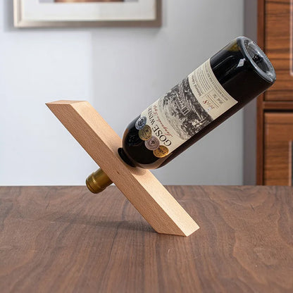 Porte bouteille vin avec vin rouge sur la table